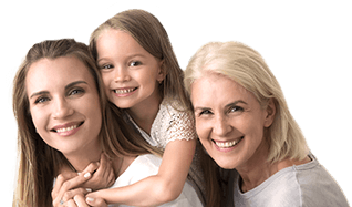 Mother daughter and granddaughter smiling together