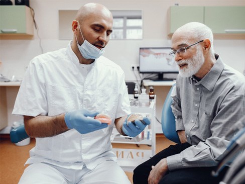 Man talking to a dentist