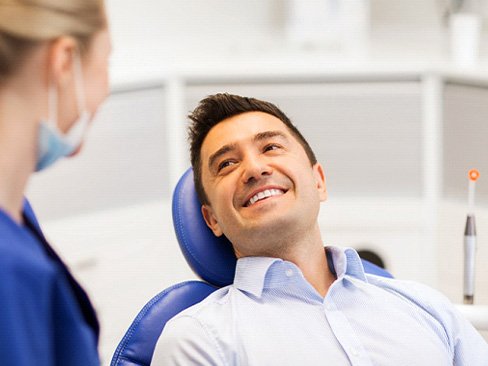 Man smiling in the dental chair