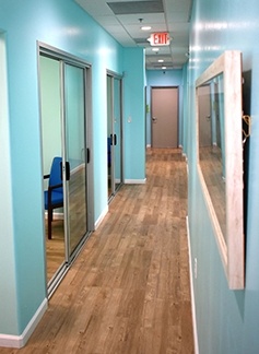 Hallway leading to dental exam rooms