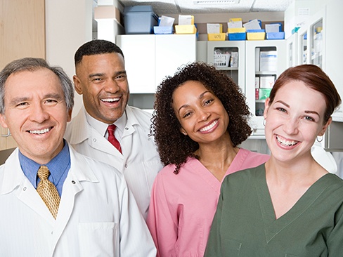 Dental team members happy in the office