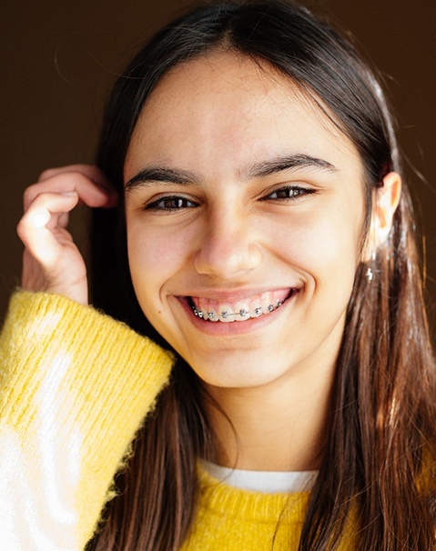 Girl wearing braces in Garland